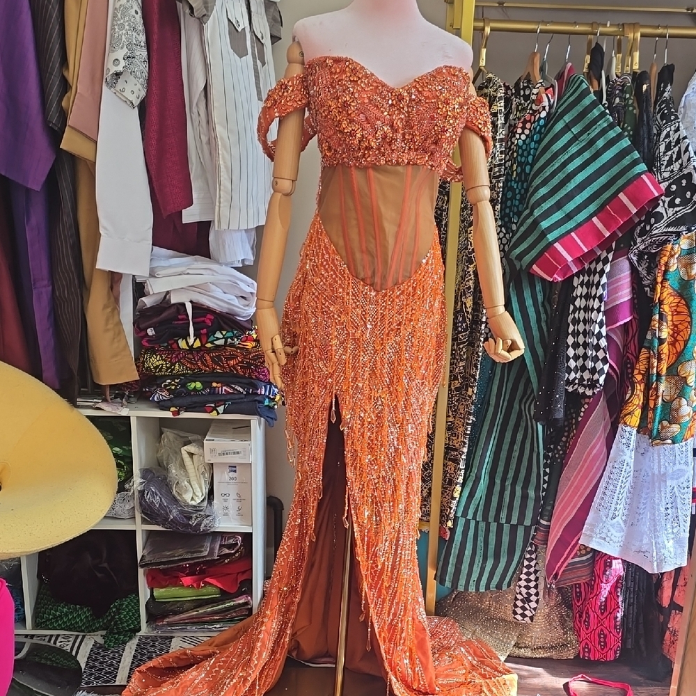 Vibrant Orange Prom Dress with Elegant Detailing